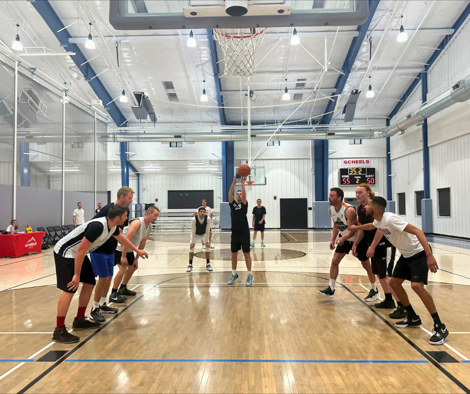 Photo of a man shooting a free throw during a basketball game